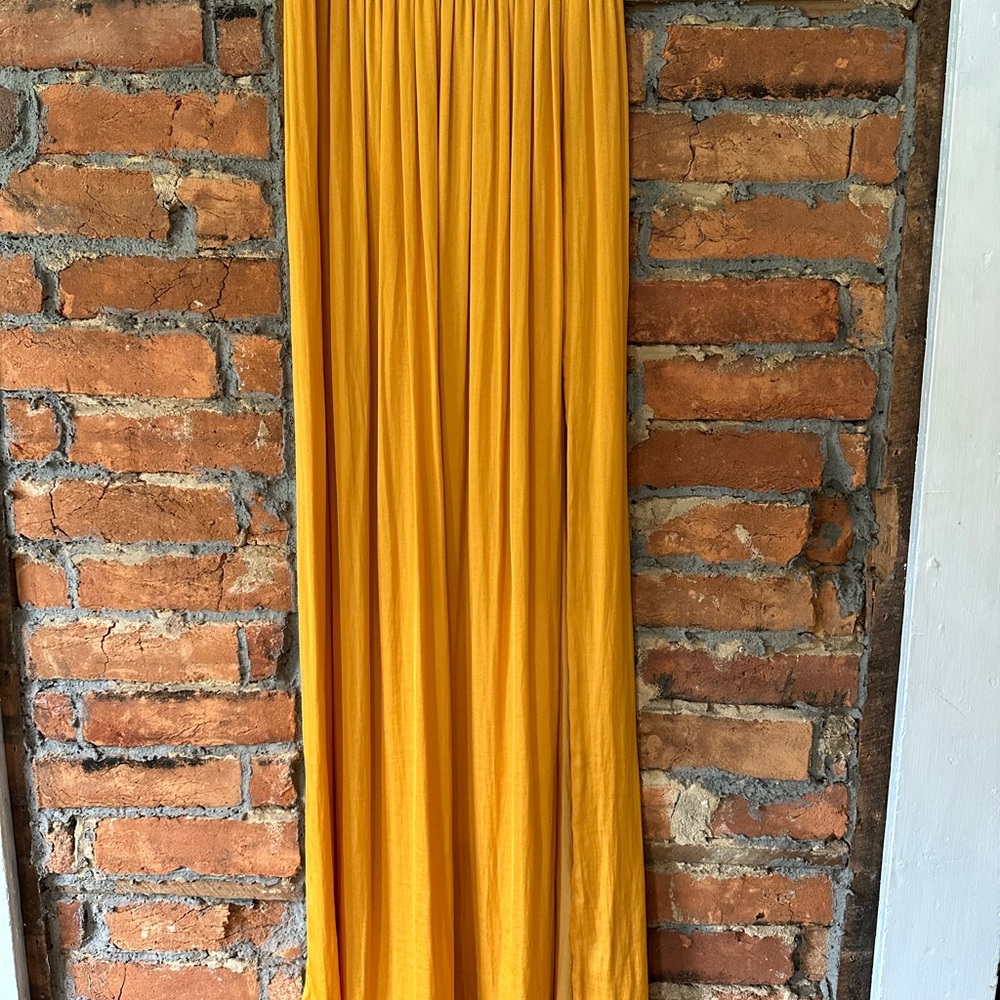Long flowing skirt with dual side slits.